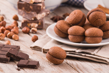 Hazelnut shortbread sandwiches filled with chocolate cream