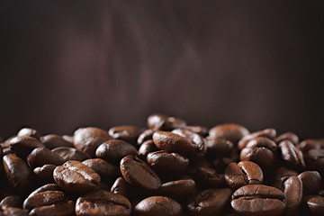 coffee beans and brown wall with smoke