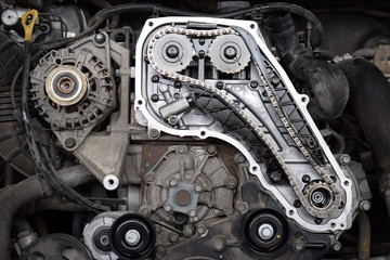 Close up of the mechanics of a car engine.