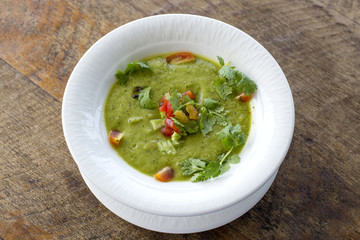 Traditional Spanish cold soup gazpacho on wooden table