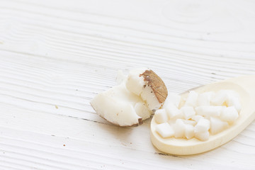 Natural herbal skin care products, top view ingredients coconut on table concept of the best all natural face moisturizer. Facial treatment preparation background