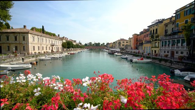 Port of Peschiera del Garda - town and commune near Venice , Italy .