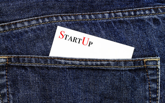 StartUp business card in a trouser pocket