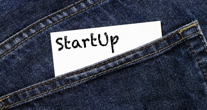 StartUp business card in a trouser pocket