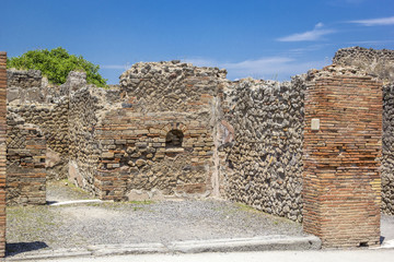 Streets and stone houses of the ruined ancient city of Pompeii, Pompei, Naples, Italy.