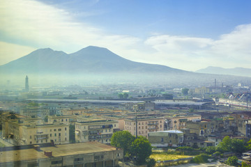 Vesuvius volcano and the city of Naples in morning haze, mist in early morning, Naples, Campania, Italy