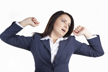 Sleepy manager. Woman yawns and pulls his hands up. Isolated on white background