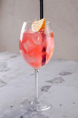 Classic Italian Aperol Spritz cocktail consisting of prosecco, aperitif and soda water with orange...