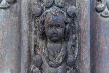 Medieval Gothic Church wooden door detail in Sibiu, Romania