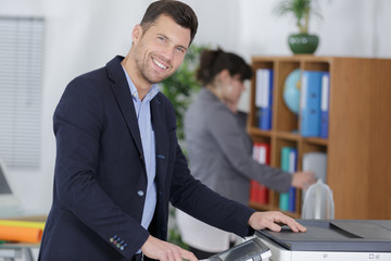 businessman printing and scaning a document
