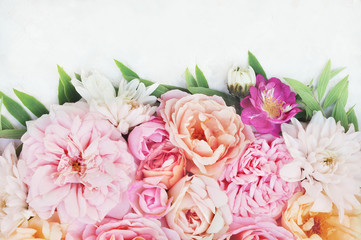 Summer blossoming delicate roses on blooming flowers festive background, pastel and soft bouquet floral card, selective focus, toned