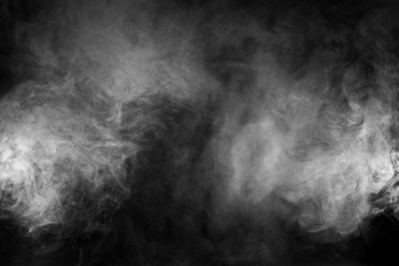 White smoke texture on a black background. Texture and abstract art