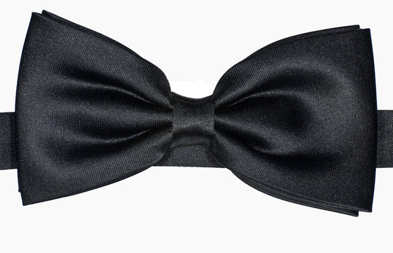 Black Bow Tie Against A White Background.