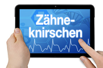 Tablet mit Diagnose Zähneknirschen