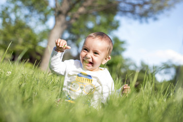 Happy baby in the park