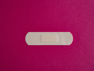 Aid band on red background