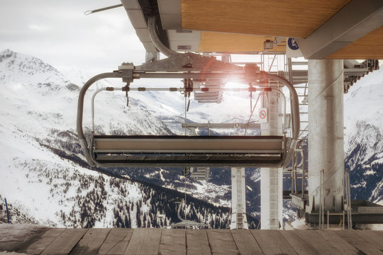ski lift and snow in sunlight in winter season, on french alps