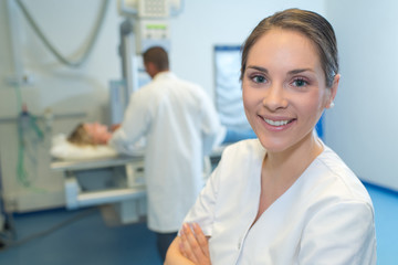 Obraz premium portrait of a beautiful happy female doctor standing