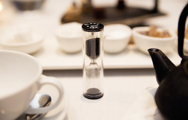 set for tea in the restaurant and hourglass