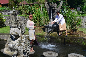 Traditional wedding in balinese water temple palace