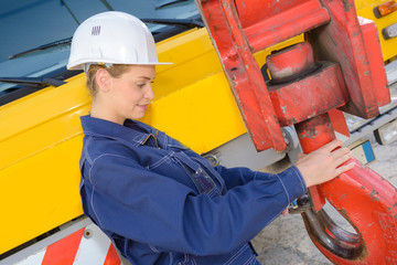 woman operating crane