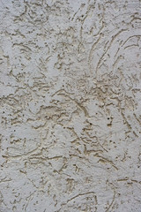 Texture of the decorative stucco wall as a background. Bark beetle style
