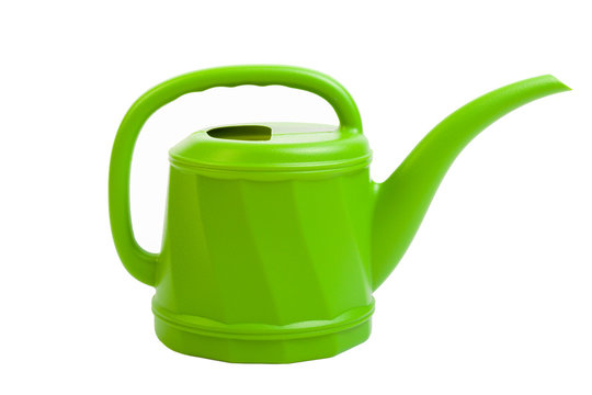 Plastic green watering can on white.