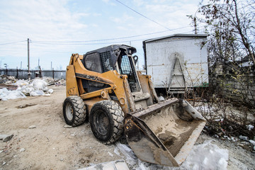 Fototapeta na wymiar excavator loader machine during earthmoving works