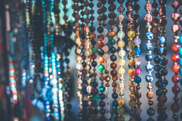 Women beads and necklace in jewerly market. Bali island.