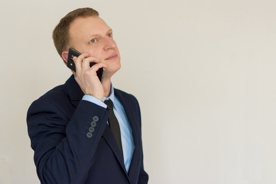 Business man speaking on mobile phone