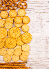 Mix of snacks : pretzels, crackers, cookies.