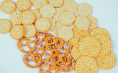 Mix of snacks : pretzels, crackers, cookies.