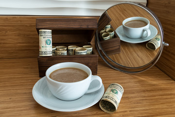 Investment risk, Money investment. Making money in coffee drinking comfort. Dollars in the wooden box.