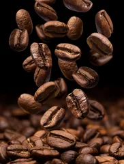 Gordijnen Falling coffee beans. Dark background with copy space © xamtiw