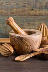 Set of wooden kitchen utensils .