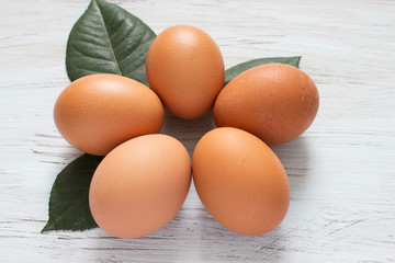 Easter decor. Colored easter eggs on a wooden board.