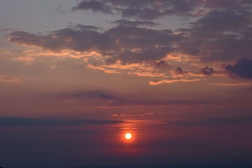 Beautiful sunset - sunrise with clouds. Sky with clouds. Colorful natural background.