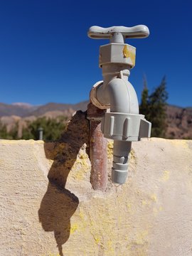 tap water in the blue sky
