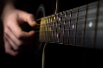 Close up of an guitar being