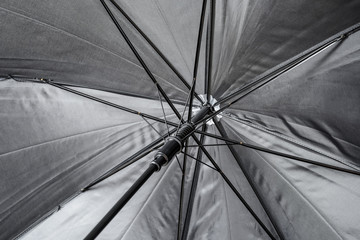 Open black umbrella, closeup