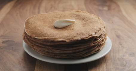 sour cream on top of pancakes or blini