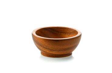 A wooden bowl on a white background