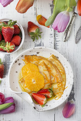 Crepe suzette, traditional french pancakes with orange syrup