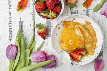 Crepe suzette, traditional french pancakes with orange syrup