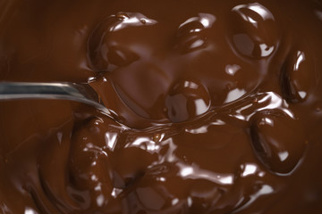 melting dark chocolate in steel bowl