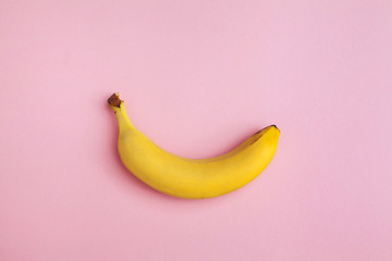 ripe banana on a pink background - Powered by Adobe