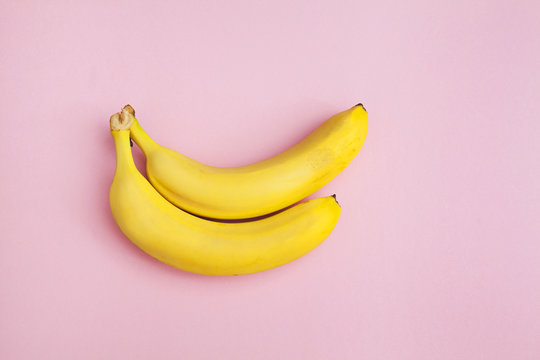 bananas on a pink background isolated