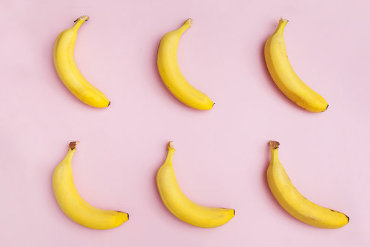 background of bananas on a pink background