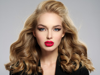 Fototapeta premium beautiful young blond girl with sexy red lips.