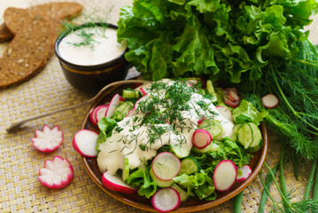Fresh cucumber and radish chopped slices for salad.
